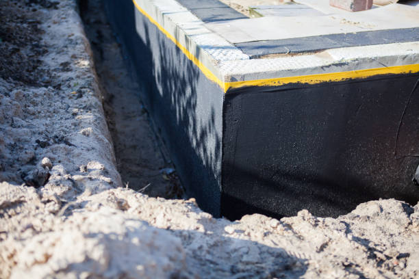 Professional Waterproofing technician working in Viola, KS